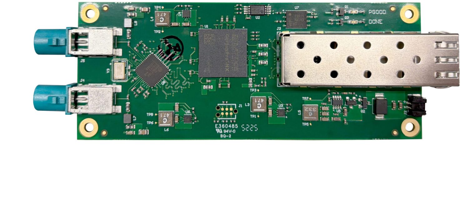 Top-down view of DA326 Holoscan GMSL Adapter featuring dual GMSL2 ports, a Lattice FPGA, and an SFP interface cage.